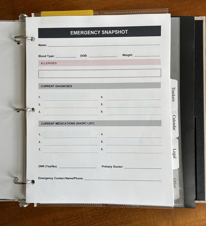 Health, Handled medical organizer open to the Emergency Snapshot sheet, with fields for allergies, diagnoses, medications, and emergency contacts.