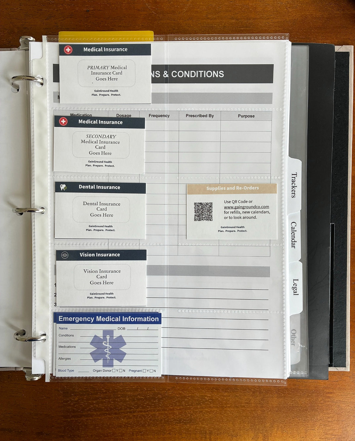 Health, Handled medical organizer with clear pockets for medical, dental, and vision insurance cards and an emergency medical information card.