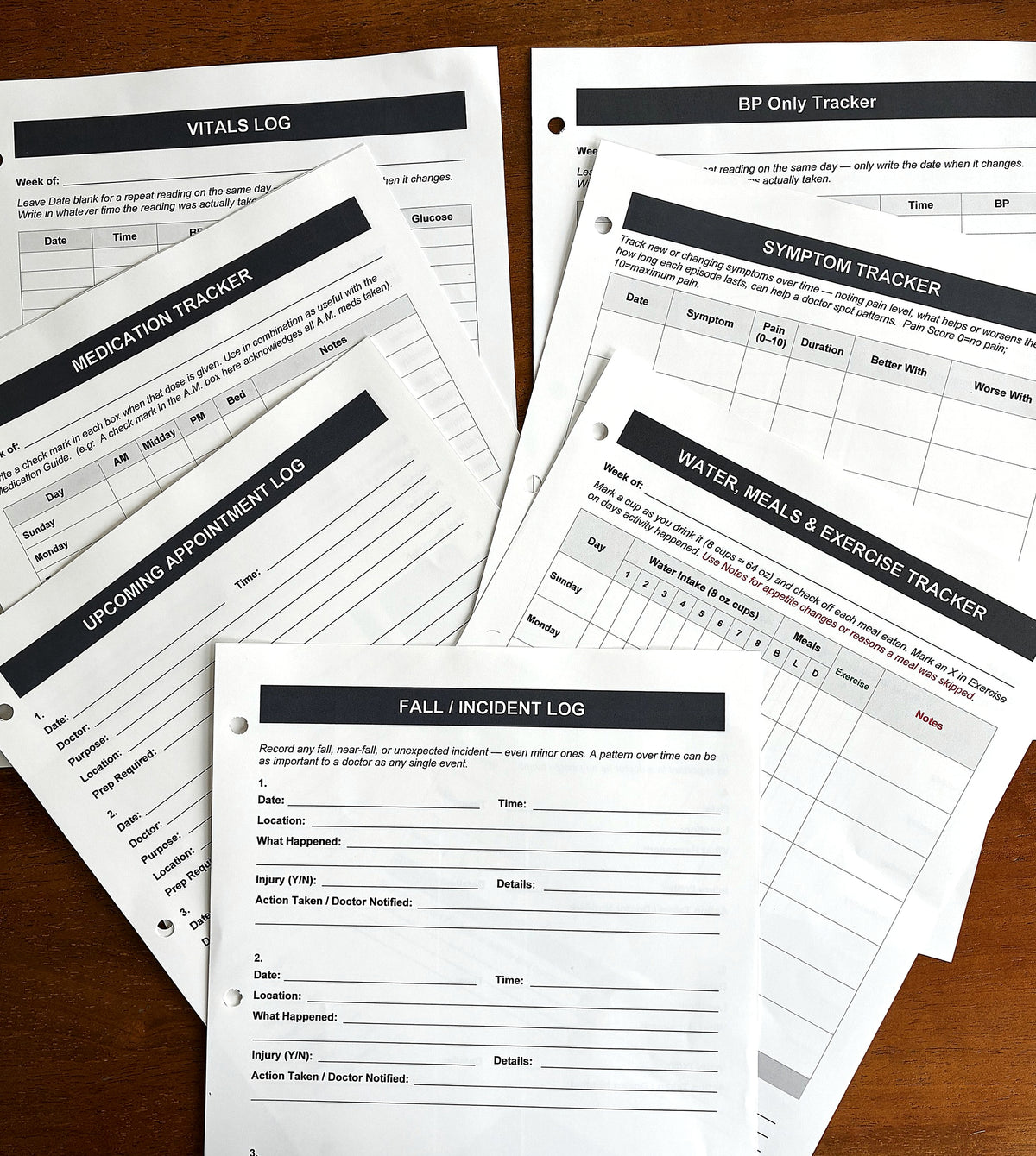 Health, Handled tracker sheets for vital signs, blood pressure, medications, symptoms, appointments, water, meals, exercise, and falls or incidents.